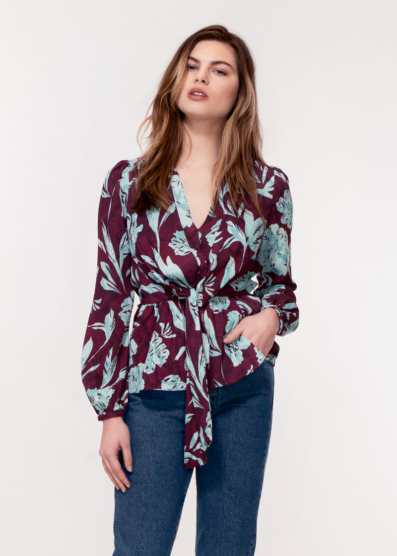Long sleeve, V neck tie front top in purple and turquoise snake print
